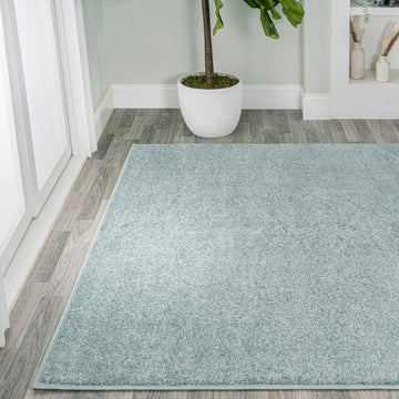 Haze Solid Low-pile Area Rug Light Blue